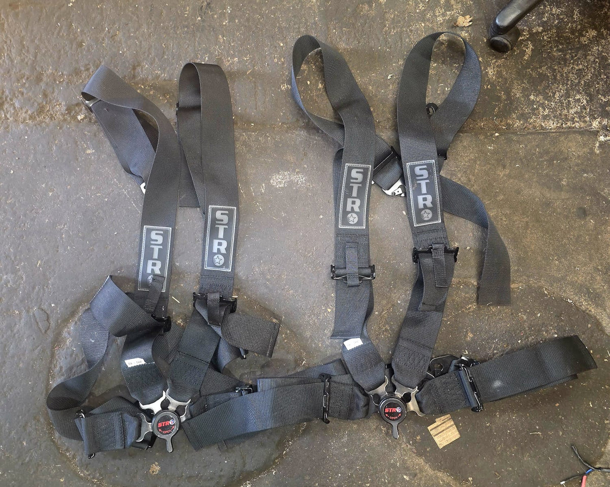 pair of STR 4 point harnesses