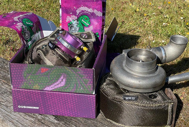 Exoracing external wastegate blanket protecting nearby vacuum lines