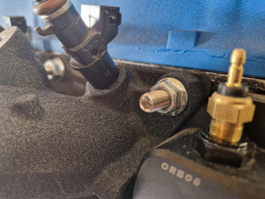 Exoracing extended manifold stud hex tip installation feature