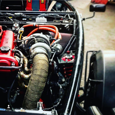 Exoracing titanium fibreglass exhaust wrap texture close up