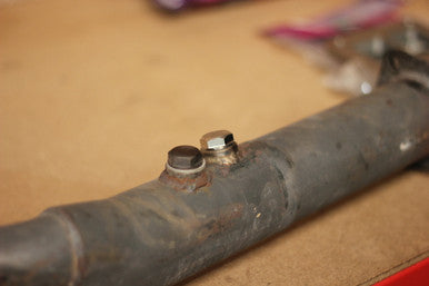 Open lambda sensor port before and after fitting Exoracing O2 sensor plug