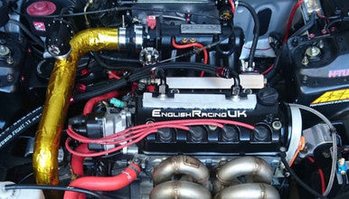 Heat reflective sheet fitted to performance car airbox