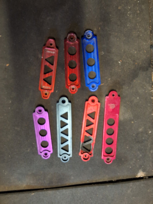 Collection of battery tie downs