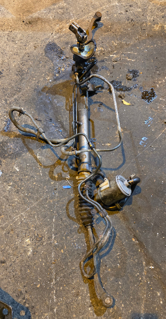 Honda ST£ steering rack with power steering lines , knuckle and reservoir